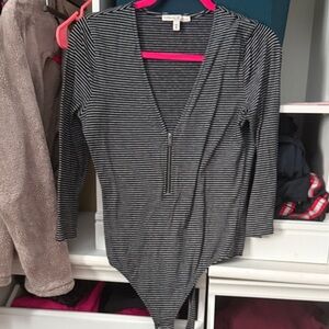 Express black and white striped zip up bodysuit medium